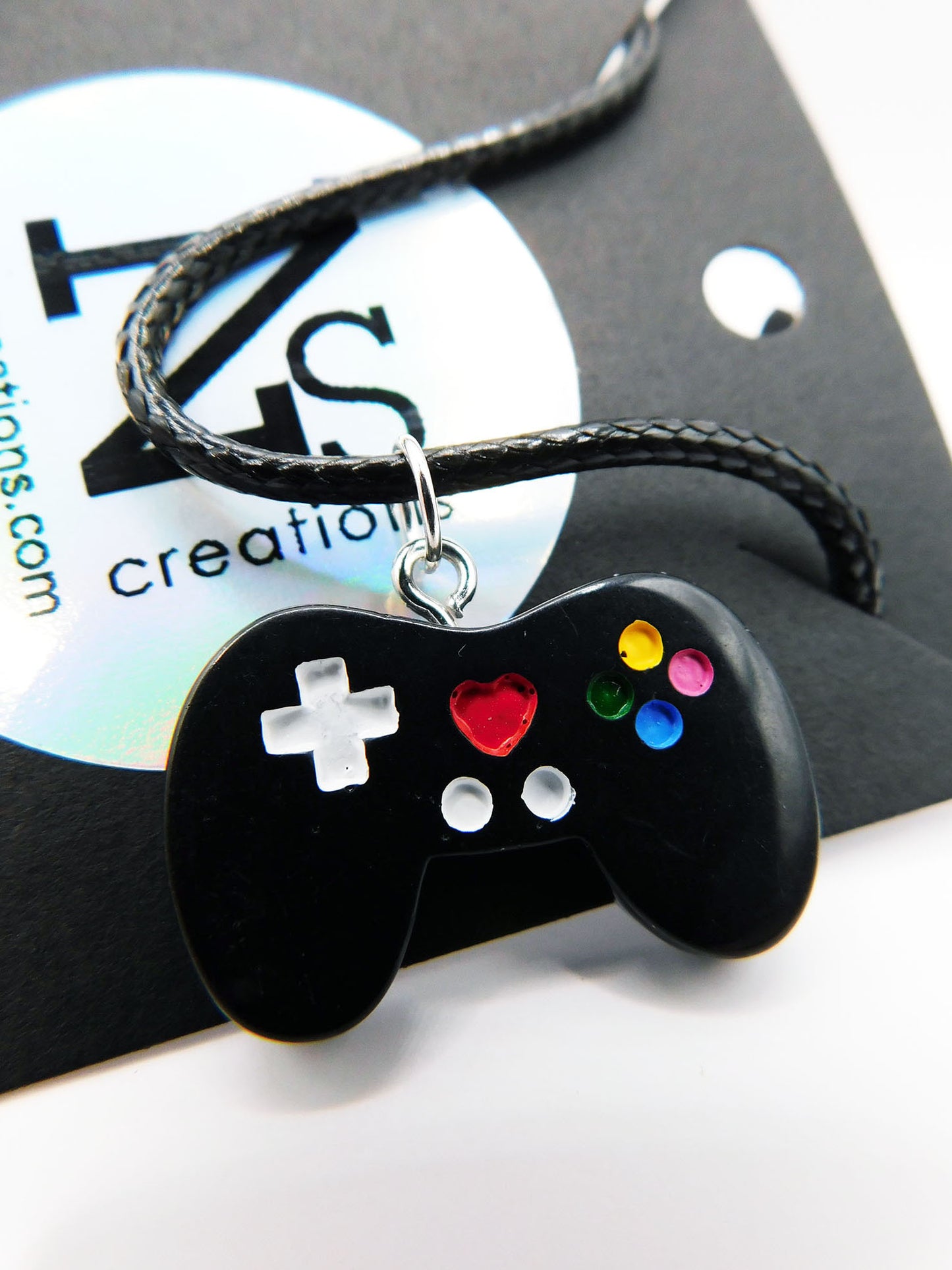 Pendentif manette de jeu vidéo