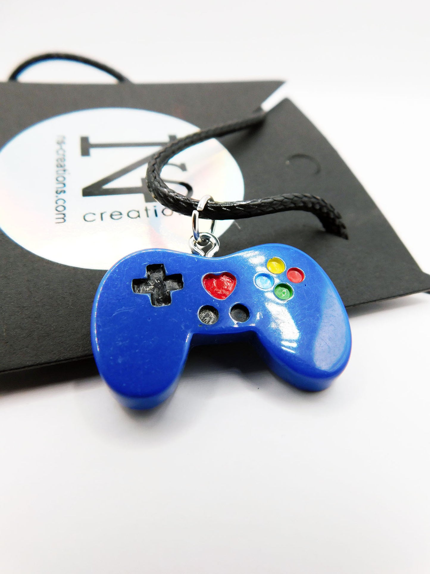 Pendentif manette de jeu vidéo