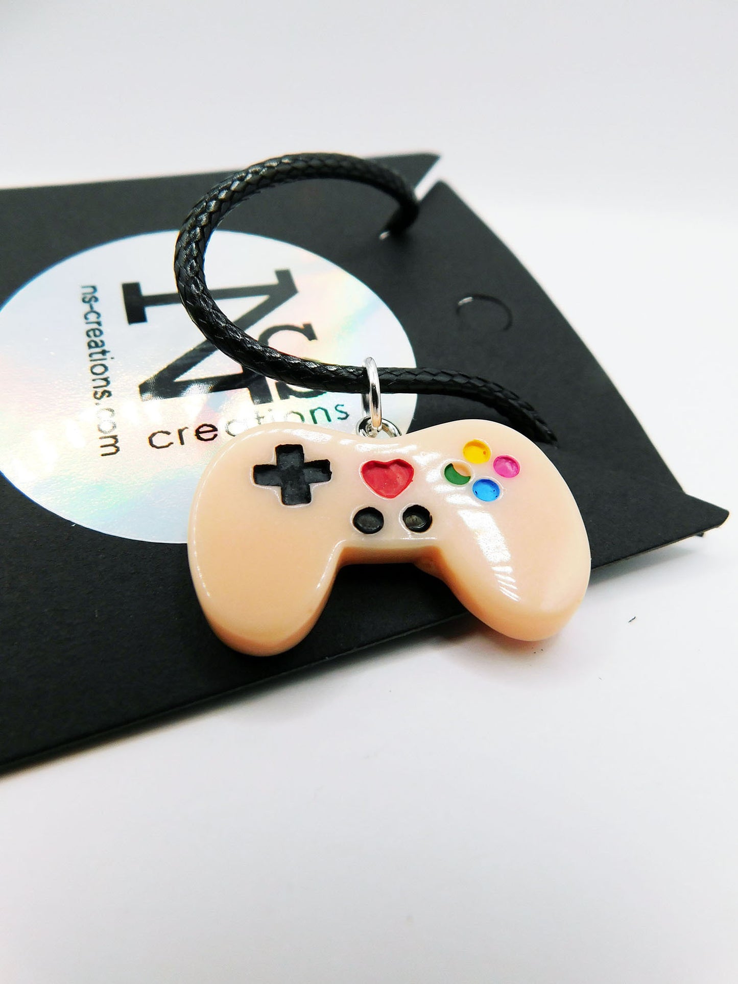 Pendentif manette de jeu vidéo